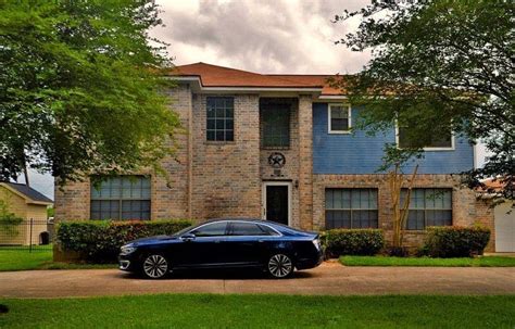 Parking in front of the house .